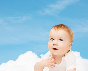 Image showing smiling baby looking up