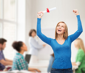 Image showing smiling woman with diploma