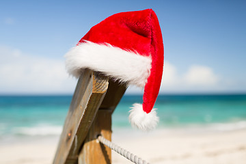 Image showing close up of santa helper hat on beach