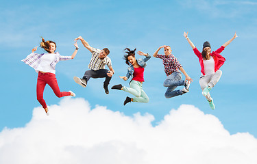 Image showing group of teenagers jumping