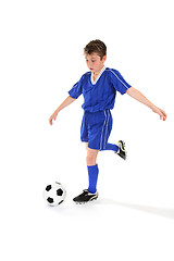 Image showing Kicking soccer ball