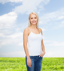 Image showing smiling woman in blank white t-shirt