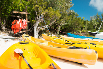 Image showing canoes on sandy beach