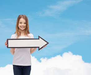 Image showing smiling girl with blank arrow pointing right