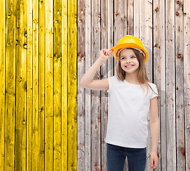 Image showing smiling little girl in protective helmet