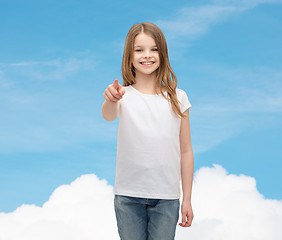 Image showing little girl in blank white t-shirt pointing at you