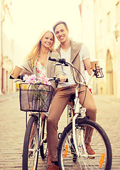 Image showing couple with bicycles in the city