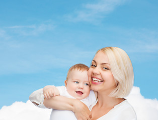 Image showing happy mother with smiling baby