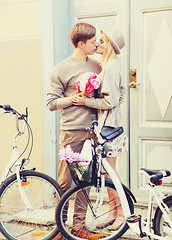 Image showing couple with bicycles in the city