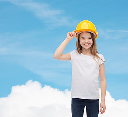 Image showing smiling little girl in protective helmet