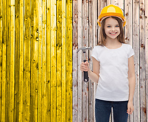 Image showing smiling little girl in protective helmet