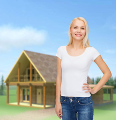 Image showing smiling woman in blank white t-shirt