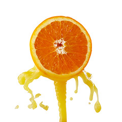 Image showing orange juice splashing on a white background