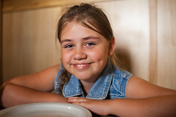 Image showing Little girl in cafe