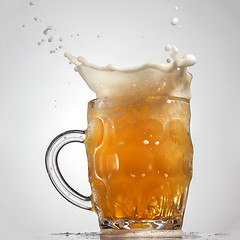 Image showing Beer splash in glass isolated on white