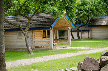 Image showing wooden cottage of recreation park in summer time 