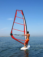 Image showing Windsurfer on waves of a gulf in the afternoon