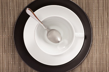Image showing White tea pair on black