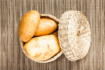 Image showing potato in wattled  box