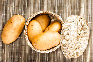 Image showing potato in wattled  box