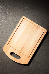 Image showing cutting board on a dark background