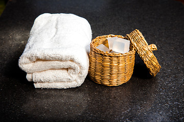 Image showing Soap in a basket and towel