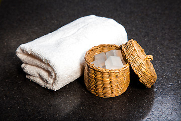 Image showing Soap in a basket and towel