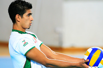 Image showing Player Holding the ball. Universiade Volleyball game between Rus