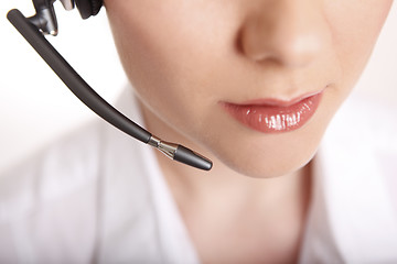 Image showing Closeup of a business woman with headset
