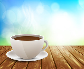 Image showing Coffee cup on wooden table