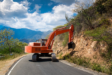 Image showing Excavator repair the road.