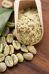 Image showing Green coffee beans with leaf