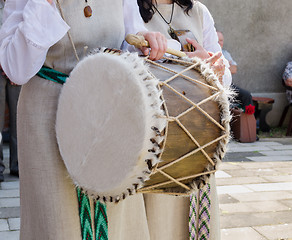 Image showing woman hand with retro vintage fur decorated drum