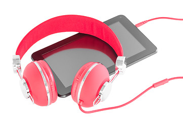 Image showing Bright red headphones and black tablet pc