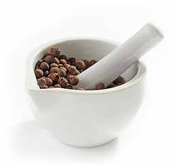 Image showing Aromatic black peppers in a mortar and pestle