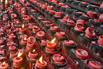 Image showing Red Candle Offereings