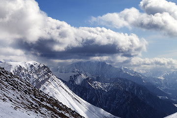 Image showing Winter mountains in evening and cloudy sky