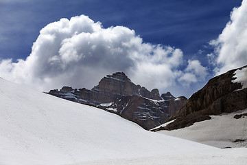 Image showing Rocks with clouds and snow plateau