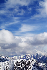 Image showing Winter snowy mountains and cloudy sky