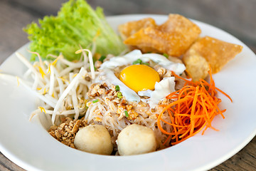 Image showing Thai Noodle Dish with Fried Egg