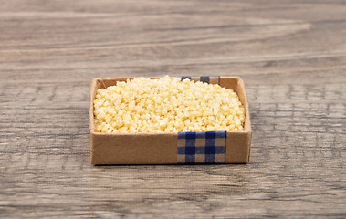 Image showing Couscous on wood