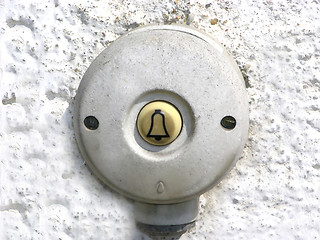 Image showing Round and dirty bell at the outside of a house