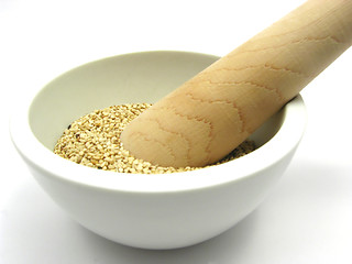 Image showing Sesame in a bowl of china ware with pestle