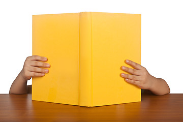 Image showing Kid reading a book