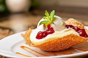 Image showing cake with jam ice cream