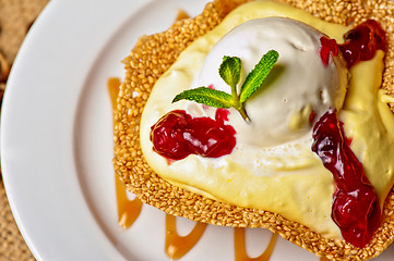 Image showing cake with jam ice cream