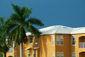 Image showing white roof on orange building