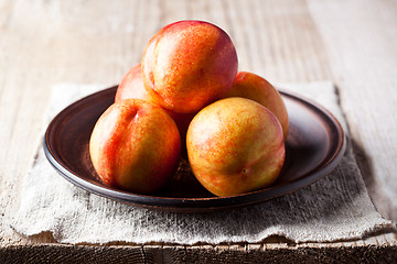 Image showing fresh nectarines in a plate