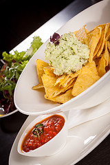 Image showing Crisp corn nachos with guacamole sauce