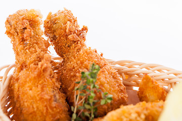 Image showing Crisp crunchy golden chicken legs and wings